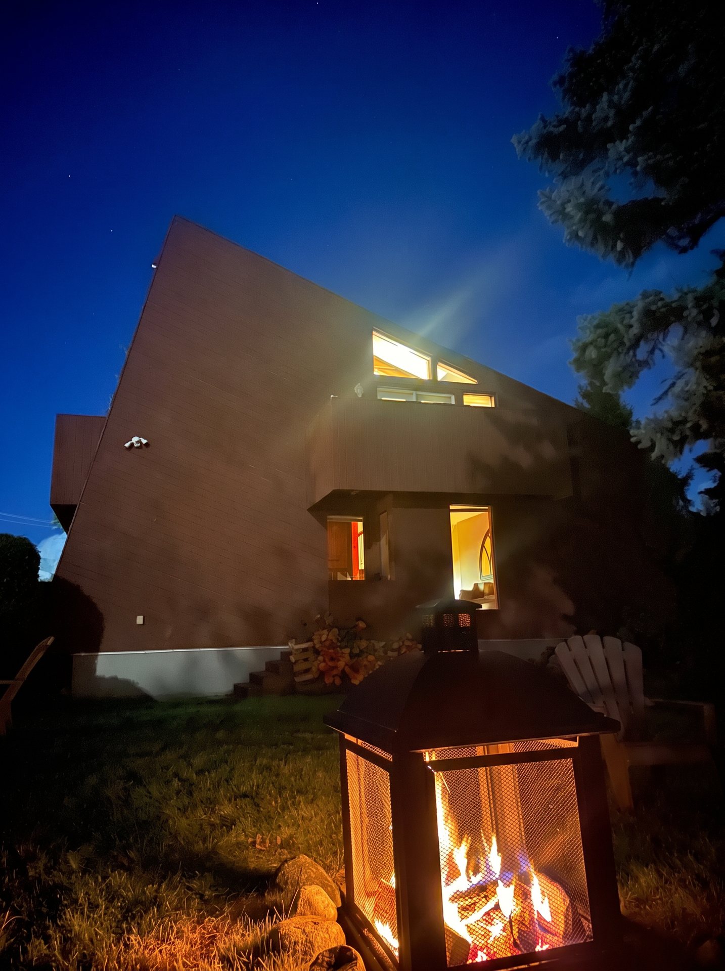 Fire pit burning in the yard at night